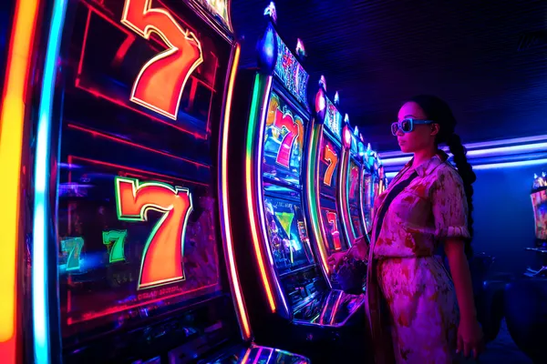 A person using their device against a moody casino-themed background, illustrating the smooth re-entry process at BDKO.
